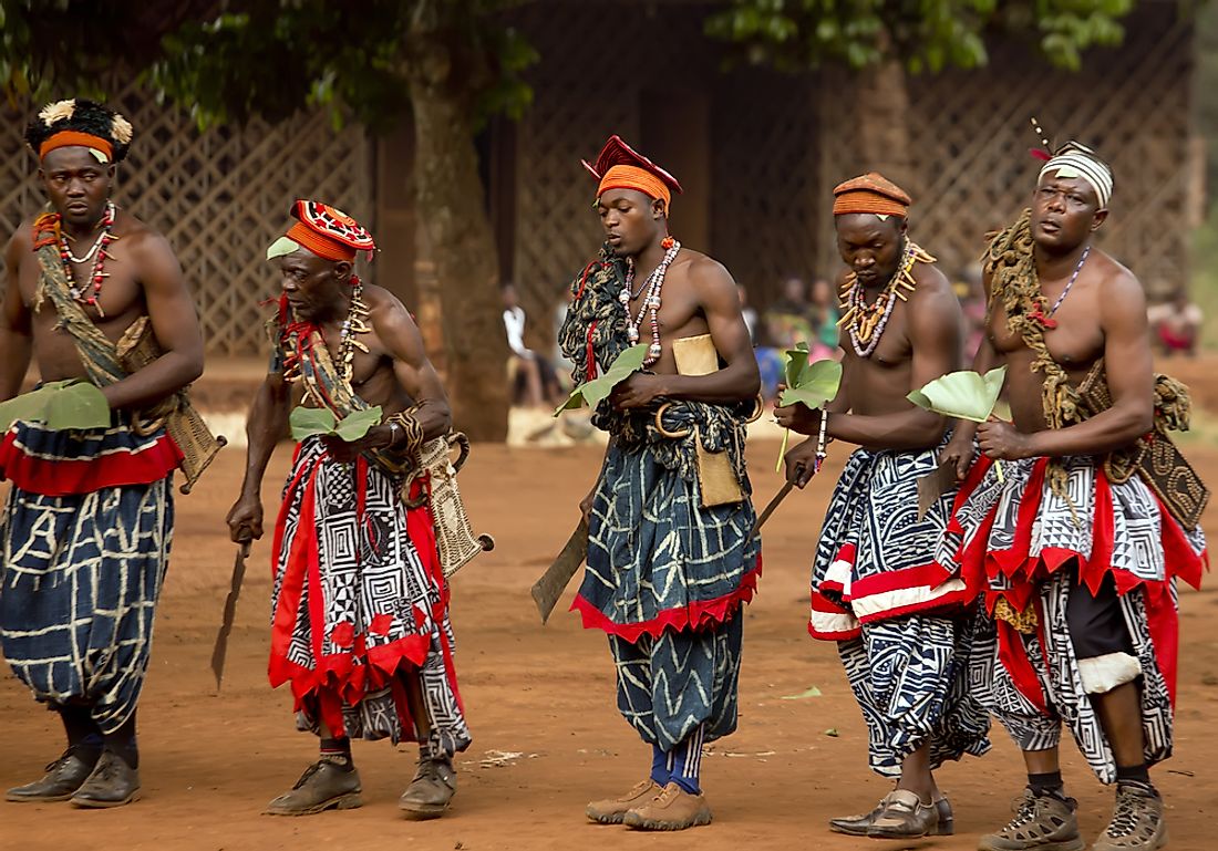 Men perform a traditional dance in the Babungo Kingdom of Cameroon. Editorial credit: akturer / Shutterstock.com.
