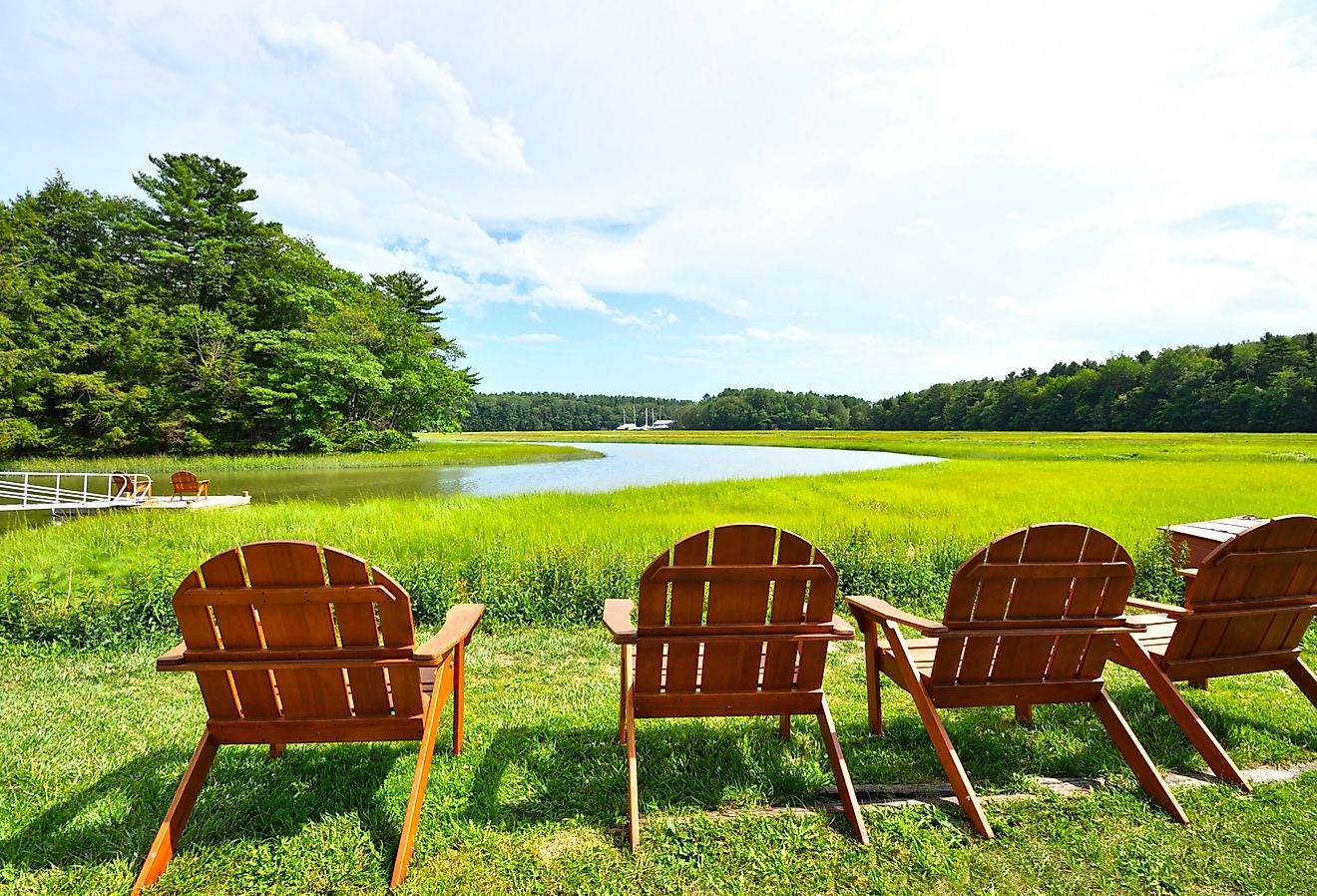 Adirondack chairs by the River Yarmouth, Maine.
