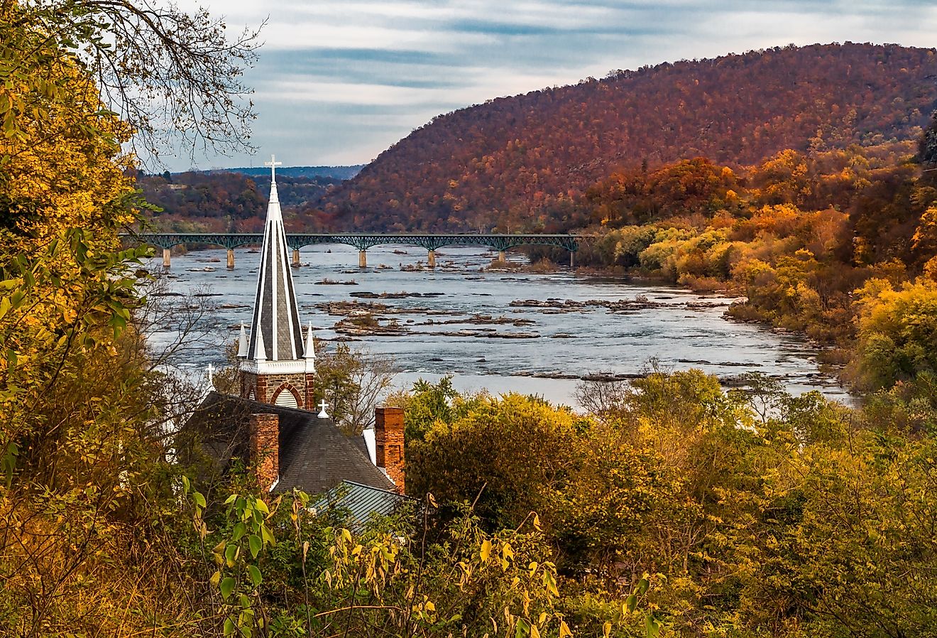 St. Peter's Roman Catholic Church in Harpers Ferry, West Virginia as it overlooks the Shenandoah River in the fall.