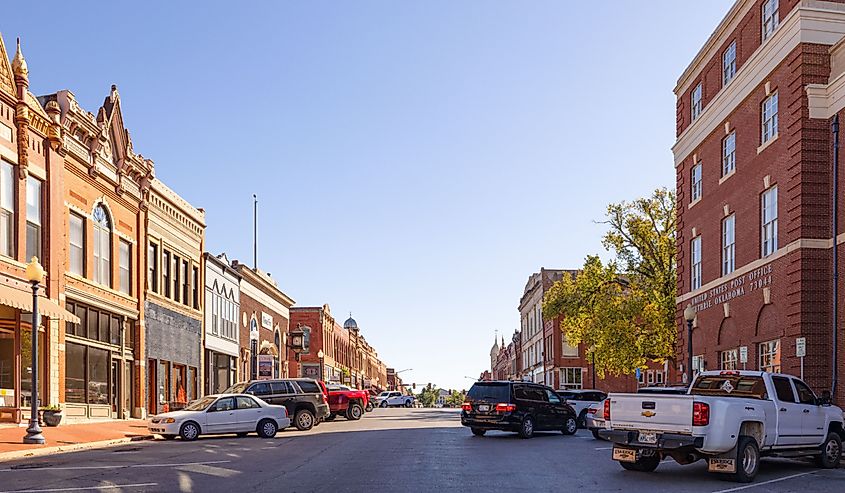 Downtown street with cars parked in Guthrie, Oklahoma.